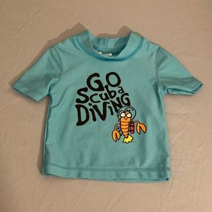 Brand new never worn Kiko & Max rash guard